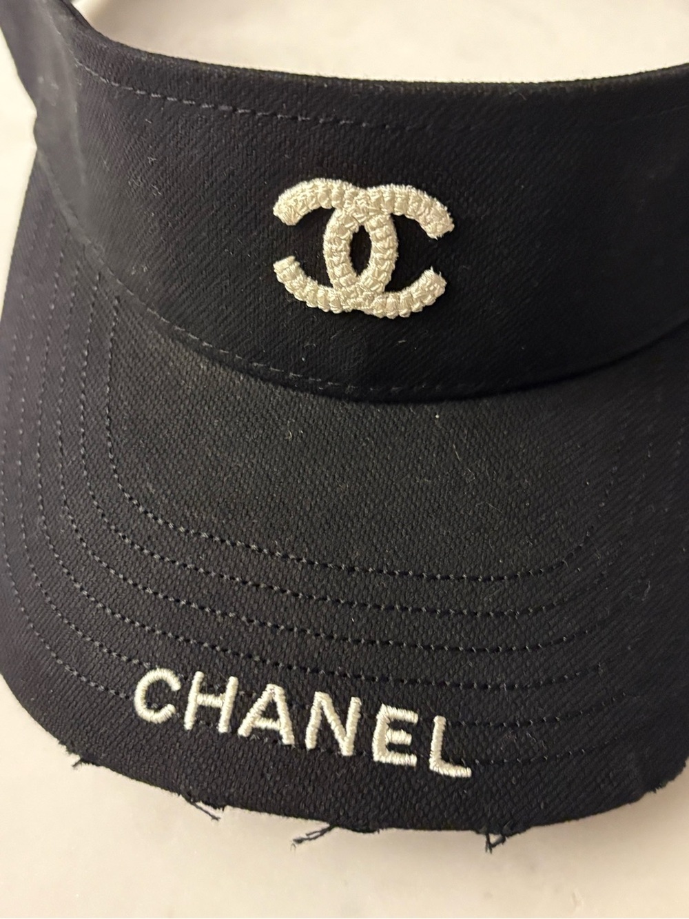 Chanel Black Visor with White Embroidered Logo